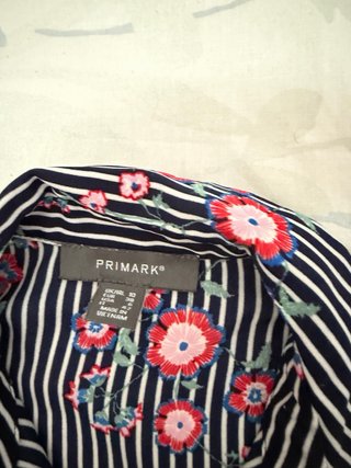Camisa de rayas con flores