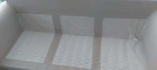 Sofá de tela beige