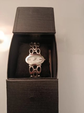 Reloj Marea Plata y Blanco