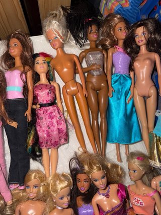 Lotto bambole Barbie e altre