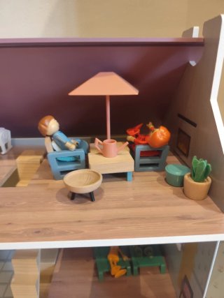 Casa de muñecas de madera
