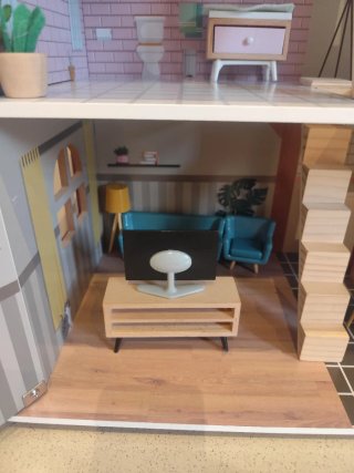Casa de muñecas de madera