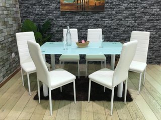 Mesa de cristal y 6 sillas blancas