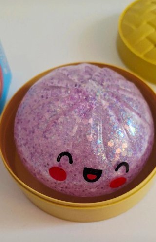 Squishy raviolo glitterato con faccina