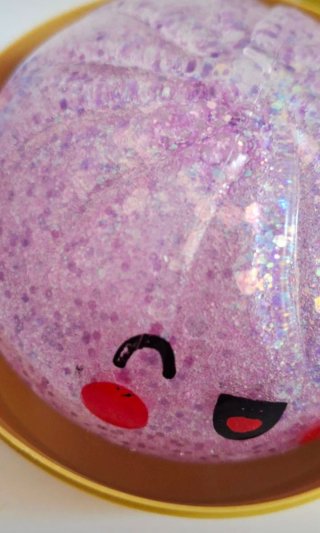 Squishy raviolo glitterato con faccina