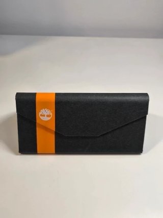 Funda gafas Timberland negra y naranja sin usar