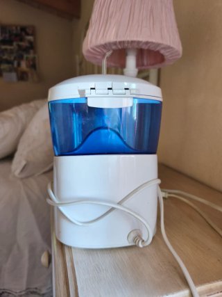 Irrigador bucal azul y blanco