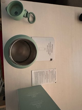 Calienta biberones portátil Momcozy