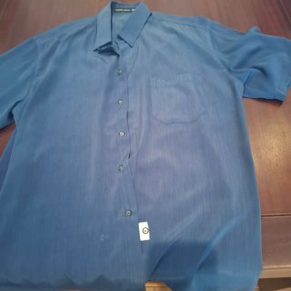 Camisa azul de verano con boton recambio  fresca