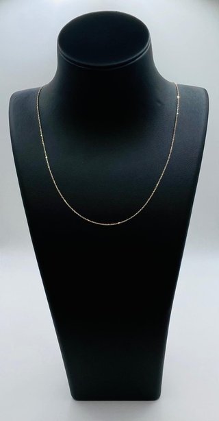CADENA FORZADA FINA ORO 18K. Peso: 1.06g