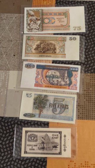 Lotto di 16 banconote del Vietnam, Yemen, Burma e altri