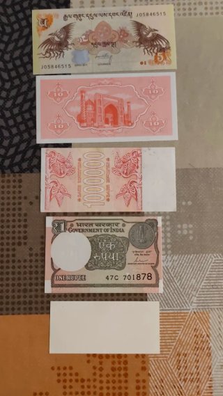 Lotto di 16 banconote del Vietnam, Yemen, Burma e altri