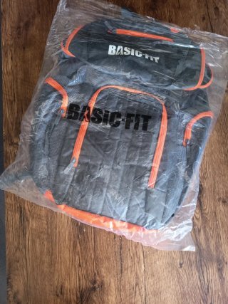 Mochila deportiva gris y naranja