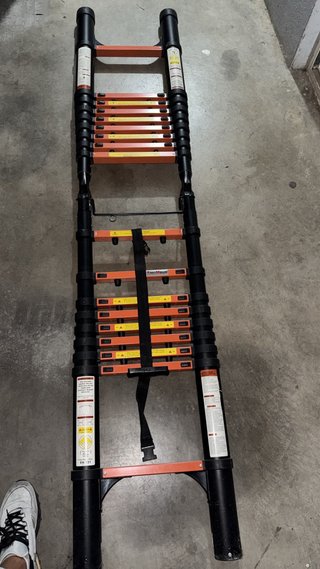 Escalera telescópica plegable