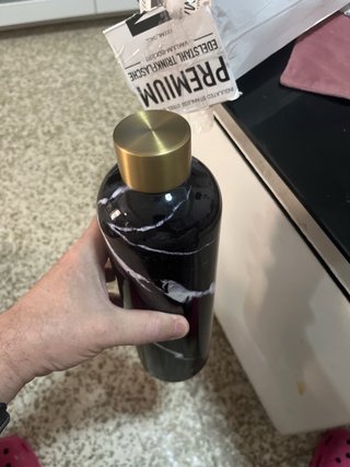 Botella MAMEIDO nueva sin  uso abierta solo foto