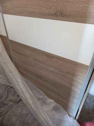 Armario puertas correderas madera y blanco