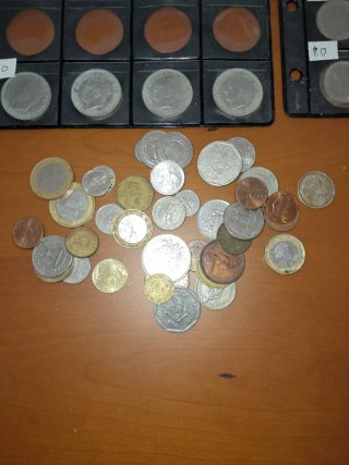 Lote de monedas y álbumes numismática
