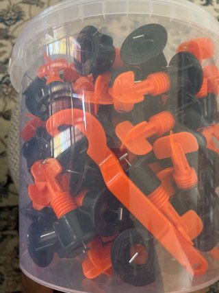 Crucetas Nivelación Baldosas Naranja/Negro