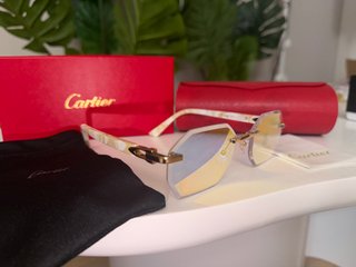 Gafas de sol Cartier azules y doradas