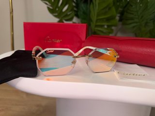 Gafas de sol Cartier azules y doradas