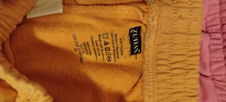 Pantalones cortos naranja y rosa