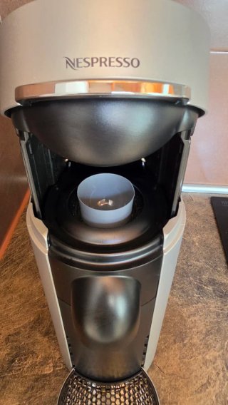 Cafetera Nespresso Plata+capsulas gratis