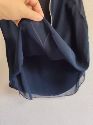 Blusa sin mangas de chica talla S-M.