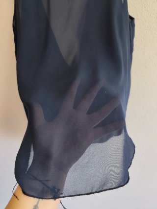 Blusa sin mangas de chica talla S-M.