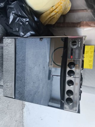 Cocina de gas con horno eléctrico