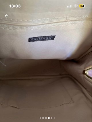Mochila beige acolchada nueva