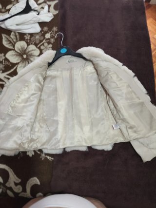 Chaqueta beige,sin uso por error de talla. Talla L