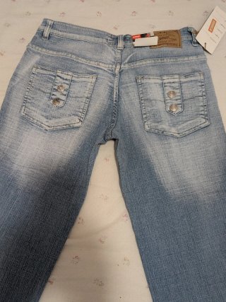 Conjunto Top Morado y Jeans el gersey no tiene eti