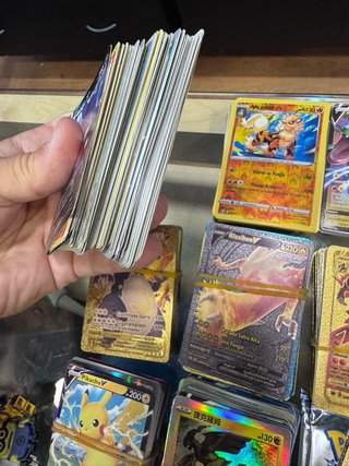 Lote Pokémon: Álbumes y Cartas unas 1000