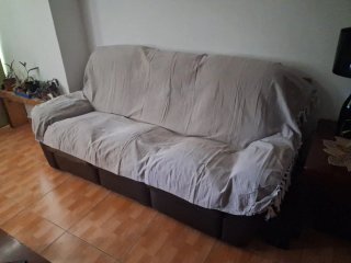 Sofá reclinable de cuero marrón