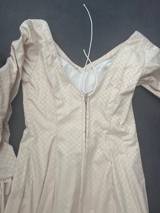 Traje de flamenca beige y rosa