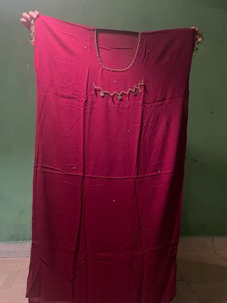 Túnica larga con rayas verticales