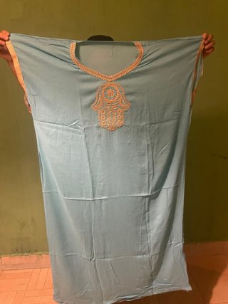 Túnica larga con rayas verticales
