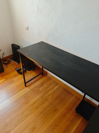 Escritorio de esquina negro.