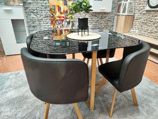 Mesa de cristal templado y 4 sillas negras