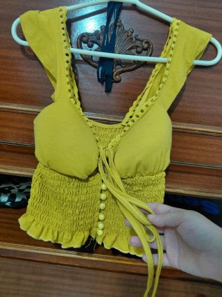 Top amarillo elástico