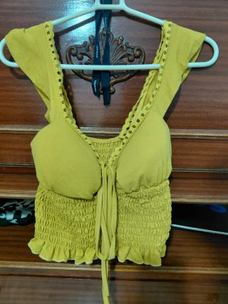 Top amarillo elástico
