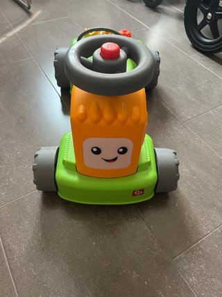 Correpasillos Fisher-Price con remolque
