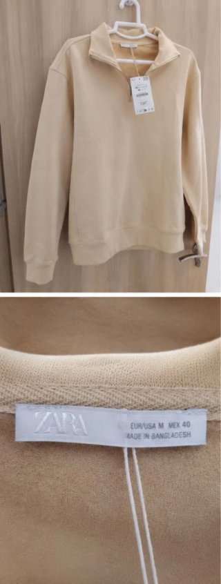 Jersey beige con cremallera