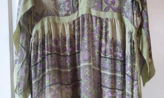 Copricostume verde e viola trasparente