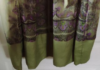 Copricostume verde e viola trasparente