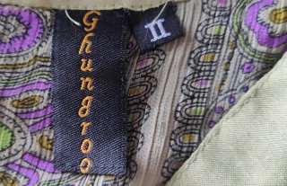 Copricostume verde e viola trasparente