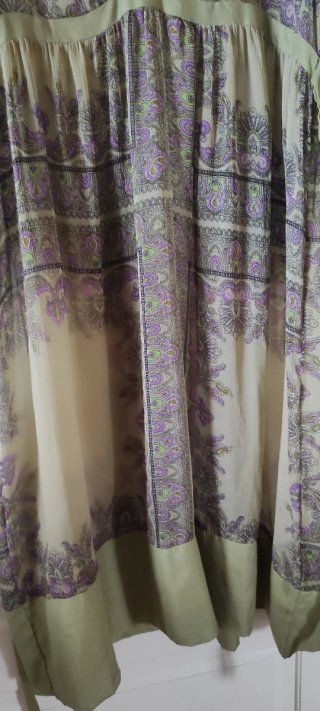 Copricostume verde e viola trasparente