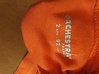 Polo cuello alto niño naranja