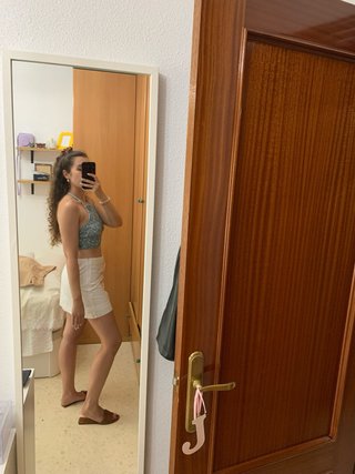 Falda pantalón blanco con lazos de Zara