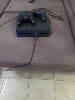 PS4 (PlayStation 4) con mando extra